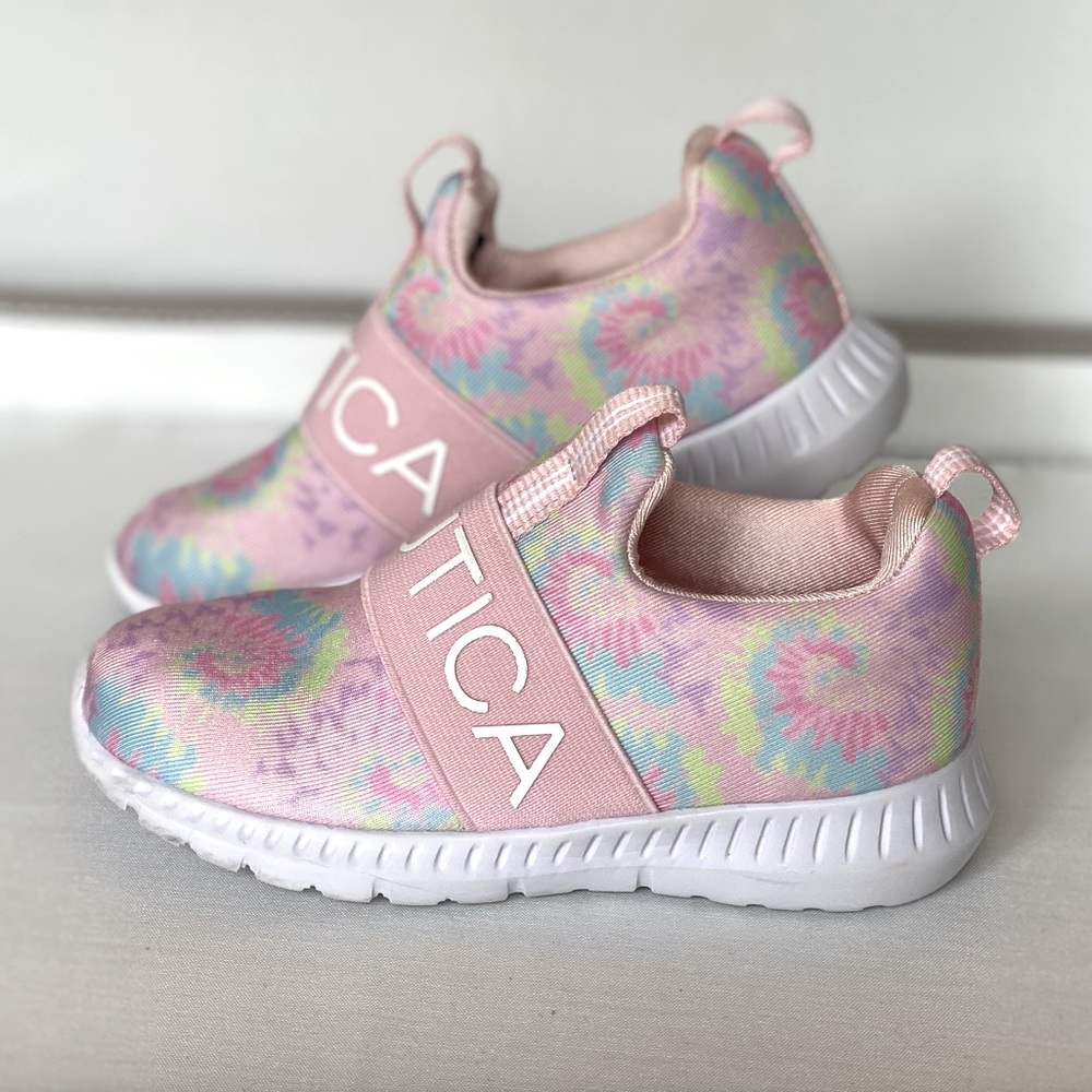Light water color nautica sneakers.  Worn.